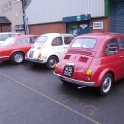 Fiat 500's and other Italian exotica outside the workshop on most days